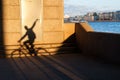 The long shadow of a cyclist