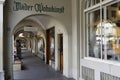 Long and shady walkway under arcades Royalty Free Stock Photo