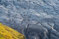 Massive crevassed glacier background texture over the hillside