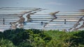 Long shot of saltmine at dusk with workers Royalty Free Stock Photo