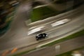 Long shutter photo of car in city track. Motion blur concept