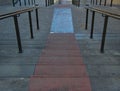 A long staircase with red steps in the middle