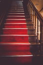 Long stairs with red carpet