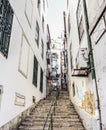 Long steep stone staircase in alleyway