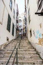 Long steep stone staircase in alleyway