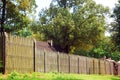 Long stockade fence