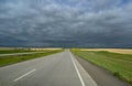 Long straight A class road on overcast day.