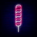 Long striped candy neon icon. Big sweetmeat. Sweet shop logo. Night bright signboard. Vector stock illustration