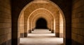 Ancient Stone Archway Corridor with Deep Perspective Royalty Free Stock Photo