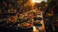 A long table set in the great outdoors, brimming with dishes crafted from local produce