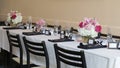 Long table with white table cloth decorated for wedding Royalty Free Stock Photo