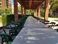 Empty tables in Valencia city park during corona closeup.