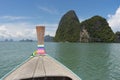 Long tail boat against blue sky in Phang Nga Bay Royalty Free Stock Photo