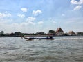 A long tail boat sailed on the Chao Phraya river