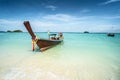 Long tail boat on tropical beach, Koh Lipe island, Thailand. Summer vacation, holiday concept. Blue sky Royalty Free Stock Photo
