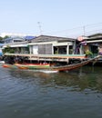 Long-tail boat wooden boat carrying tourists Travel to Thailand in the morning at Bang Luang Canal, Bangkok, Thailand, March 14,