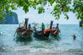 Long tail boats anchored waiting for trourist at the Hong Island in Krabi Province Thailand. Royalty Free Stock Photo