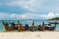 Long tail boats lined along the beach in Koh Lipe island in Thailand Royalty Free Stock Photo