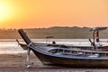 Long-tail boats at low tide at sunset, Phang-Nga Bay, Thailand Royalty Free Stock Photo