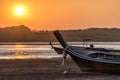 Long-tail boats at low tide at sunset, Phang-Nga Bay, Thailand Royalty Free Stock Photo