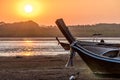 Long-tail boats at low tide at sunset, Phang-Nga Bay, Thailand Royalty Free Stock Photo