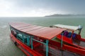 Long tail boats on the river at heavy rain Royalty Free Stock Photo