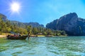 Long tail boats on tropical beach with palms, Tonsai Bay, Railay Royalty Free Stock Photo