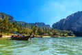 Long tail boats on tropical beach with palms, Tonsai Bay, Railay Beach, Ao Nang, Krabi, Thailand Royalty Free Stock Photo