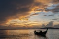 Long tail fishing boat at sunset, Koh Phi Phi, Thailand Royalty Free Stock Photo