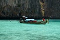 Classic Thai longtail boat in the lagoon of Phi Ley