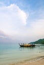 Long tailed boats near tropical beach at Ko Phi Phi, Thailand. Tropic beach with white sand and turquoise water, concept of Royalty Free Stock Photo