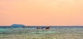 Long tailed boats near tropical beach at Ko Phi Phi, Thailand. Tropic beach with white sand and turquoise water, concept of Royalty Free Stock Photo