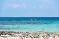 Long tailed boats near tropical beach at Ko Phi Phi, Thailand. Tropic beach with white sand and turquoise water, concept of Royalty Free Stock Photo