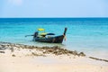 Long tailed boats near tropical beach at Ko Phi Phi, Thailand. Tropic beach with white sand and turquoise water, concept of Royalty Free Stock Photo