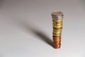 A long, tall stack of coins. Euro coin tower with free space Royalty Free Stock Photo