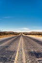 Long Texas Road disappearing into horizon