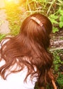 Long thick dark hair with hairclip close up photo