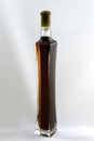 Long thin bottle of brandy