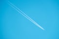 Trail of jet plane on blue sky Royalty Free Stock Photo