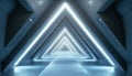 A futuristic triangular corridor illuminated by bright lights in a modern architectural setting Royalty Free Stock Photo
