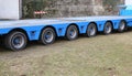 long truck with six pairs of wheels for exceptional transport Royalty Free Stock Photo