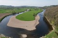 Long two sided river scenery surrounded with trees and greenlife