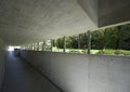 Long underground concrete corridor. Modern building