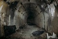 Long underground tunnel or corridor in abandoned Soviet military bunker or basement with creepy atmosphere