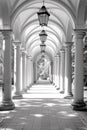 A long walkway with columns and lamps on the ceiling, AI