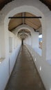 Long white corridor of ancient building Royalty Free Stock Photo