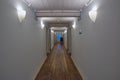 Long white corridor of a wooden house Royalty Free Stock Photo