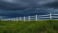 Long white fence with a stormy sky in the background Royalty Free Stock Photo