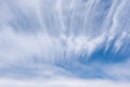 Long white wisps of clouds flowing with a large rippled cloud, Beautiful cloud in blue