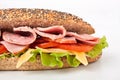 Long whole wheat baguette sandwich Royalty Free Stock Photo